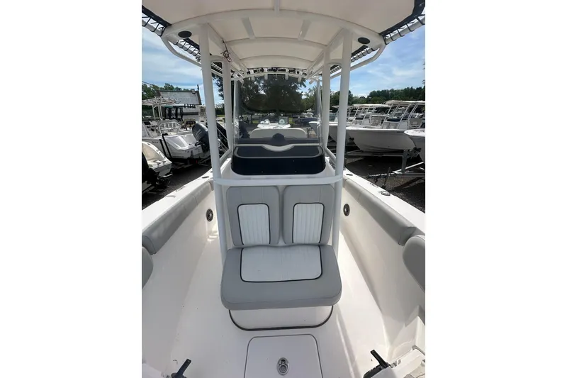 Slide: The Image of 2023 Sea Fox 228 Commander boat interior with seating and console. - 16