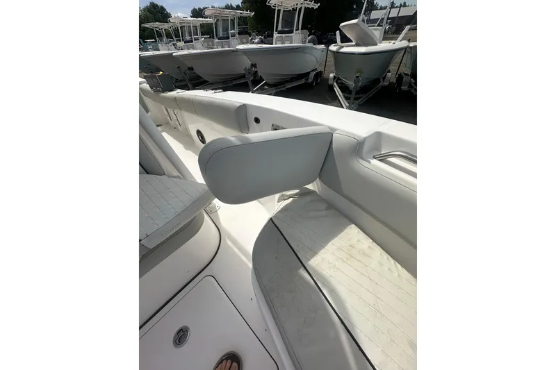 Slide: The Image of 2023 Sea Fox 228 Commander boat interior with seating and storage compartments. - 21