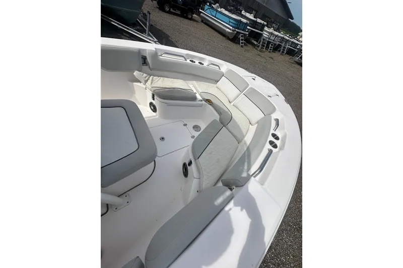 Slide: The Image of 2023 Sea Fox 228 Commander boat interior with cushioned seating and storage compartments. - 28