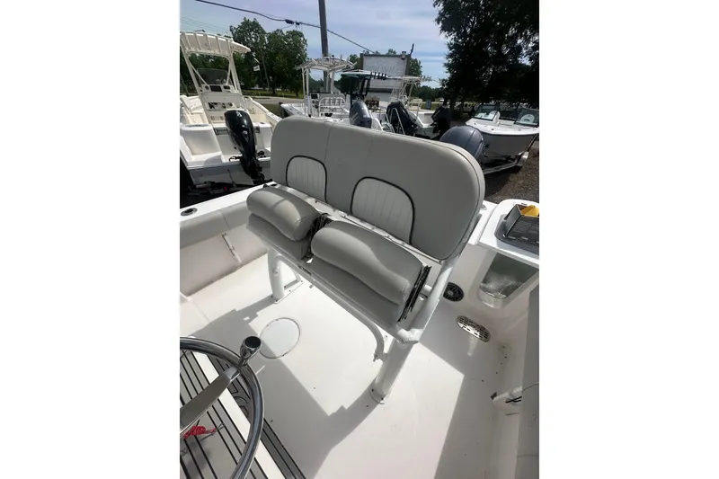 Slide: The Image of 2023 Sea Fox 228 Commander boat interior with dual seating and steering wheel. - 33