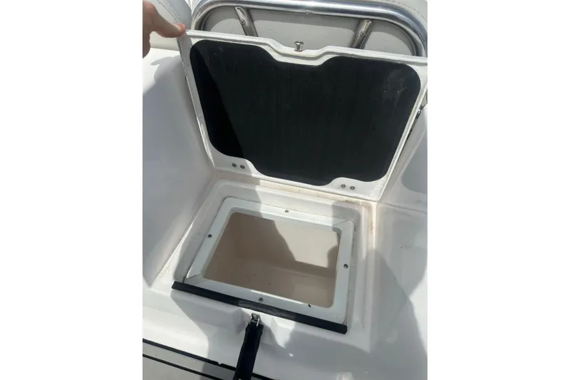 Slide: The Image of Open storage compartment on 2023 Sea Fox 228 Commander boat. - 35