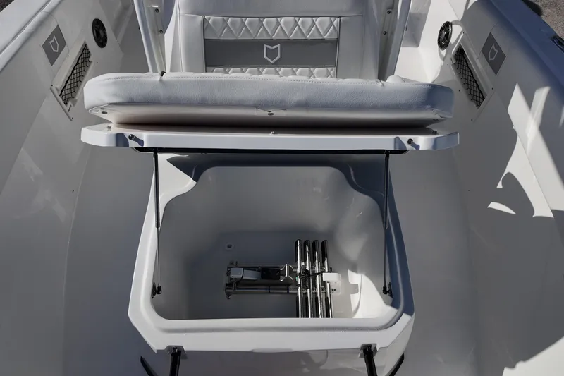 Slide: The Image of 2026 Sea Fox 268 Commander boat storage compartment with cushioned seating. - 11