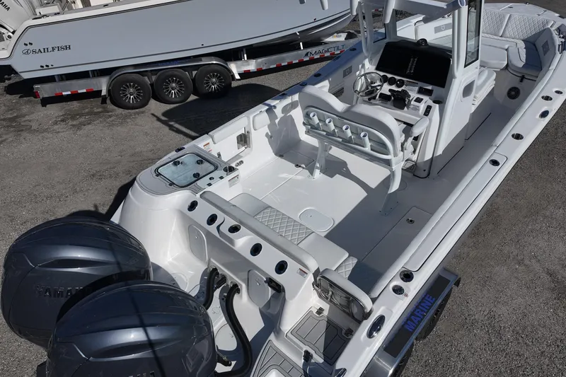 Slide: The Image of 2026 Sea Fox 268 Commander boat with dual engines, spacious deck, and modern controls. - 4