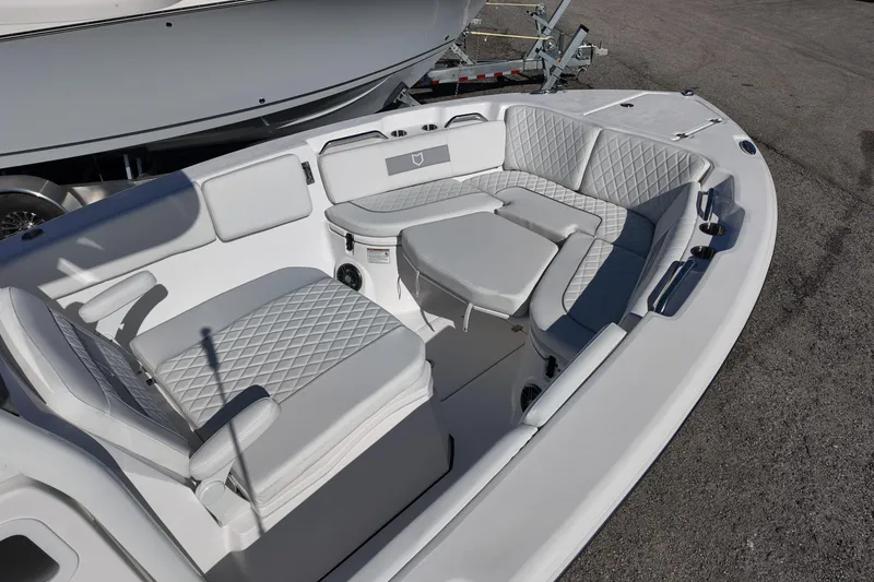 Slide: The Image of 2026 Sea Fox 268 Commander boat interior with cushioned seating and modern design. - 7