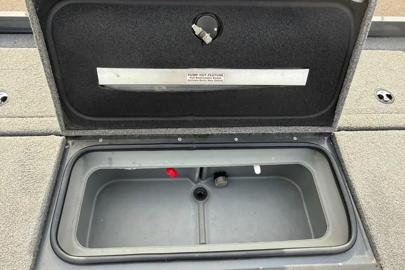 Slide: The Image of Open storage compartment in 2022 Ranger VX1888 WT boat. - 17