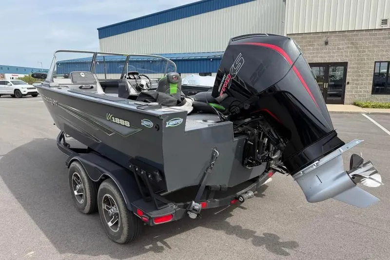Slide: The Image of 2022 Ranger VX1888 WT boat with powerful outboard motor on trailer. - 4