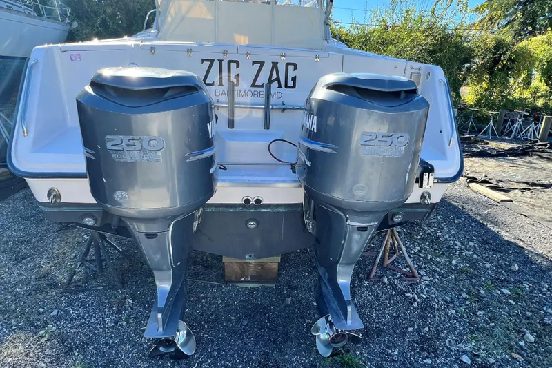 Slide: The Image of 2004 Grady-White Express 330 boat with twin Yamaha 250 outboard engines. - 34