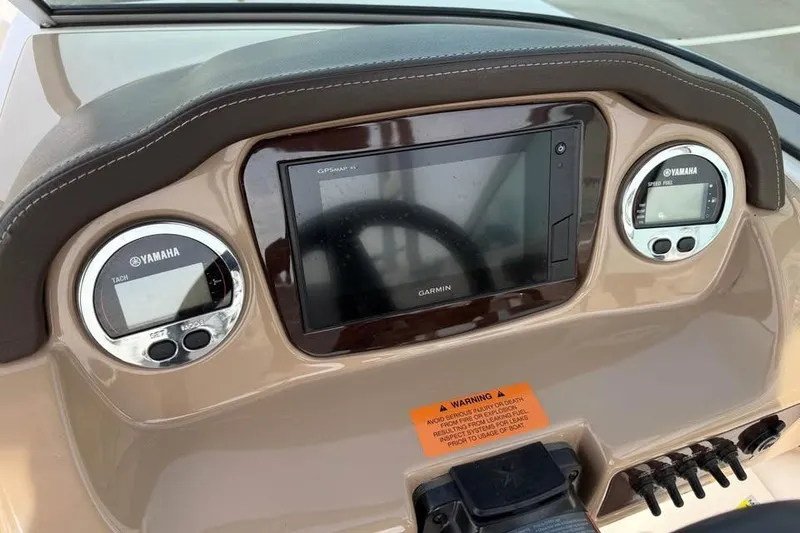 Slide: The Image of Dashboard of 2020 Chaparral 21 SSi OB with Garmin and Yamaha displays. - 12