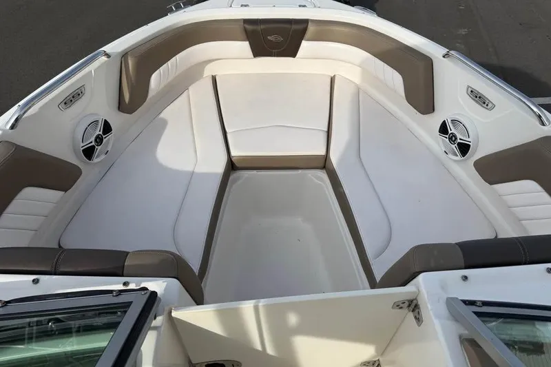 Slide: The Image of 2020 Chaparral 21 SSi OB boat interior with spacious seating and built-in speakers. - 13