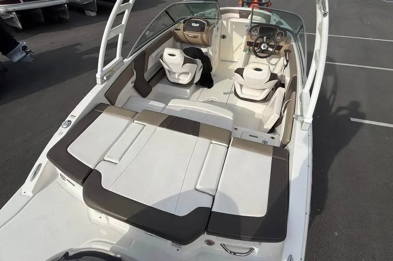Slide: The Image of 2020 Chaparral 21 SSi OB boat interior with seating and steering wheel. - 5