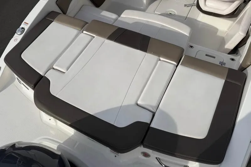 Slide: The Image of 2020 Chaparral 21 SSi OB boat interior with cushioned seating area. - 7