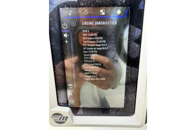Slide: The Image of Dashboard displaying engine diagnostics for 2021 Malibu M240 boat. - 22