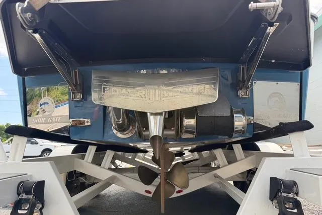 Slide: The Image of 2021 Malibu M240 boat stern with propeller and surf gate system. - 8