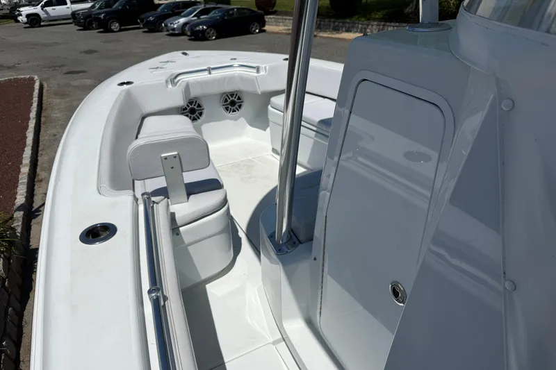 Slide: The Image of 2024 Contender 25 Tournament boat interior with seating and storage compartments. - 15