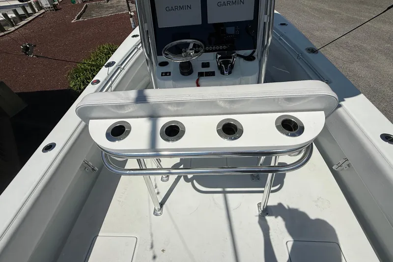 Slide: The Image of 2024 Contender 25 Tournament boat cockpit with rod holders and Garmin electronics. - 18