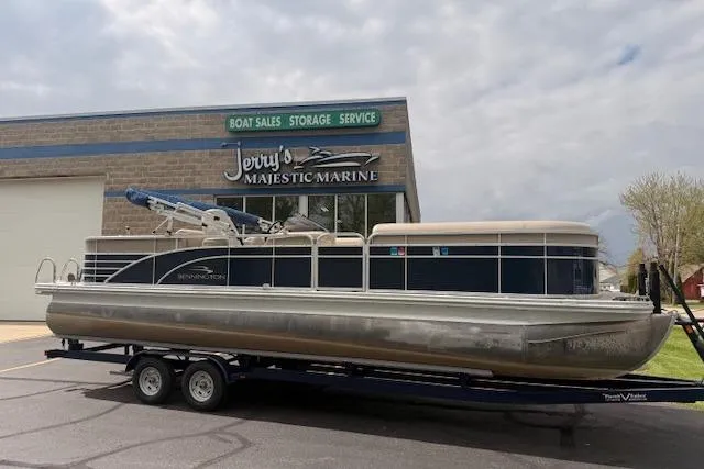 The Image of 2012 Bennington 2574 GCW pontoon boat on trailer at Jerry's Majestic Marine. - 0