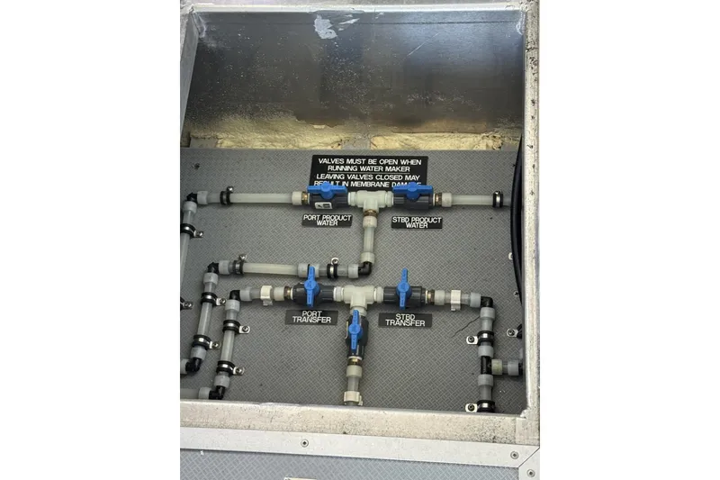 Slide: The Image of Water valve system on a 2015 Armstrong Marine Power Cat, labeled for port and starboard transfer. - 17