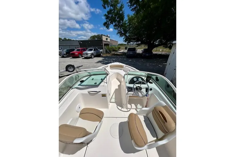 Slide: The Image of 2015 Pioneer 175 Venture boat interior with steering wheel and seating. - 4