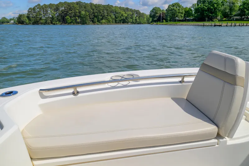 Slide: The Image of 2023 Boston Whaler 280 Dauntless boat seat with scenic water view. - 26