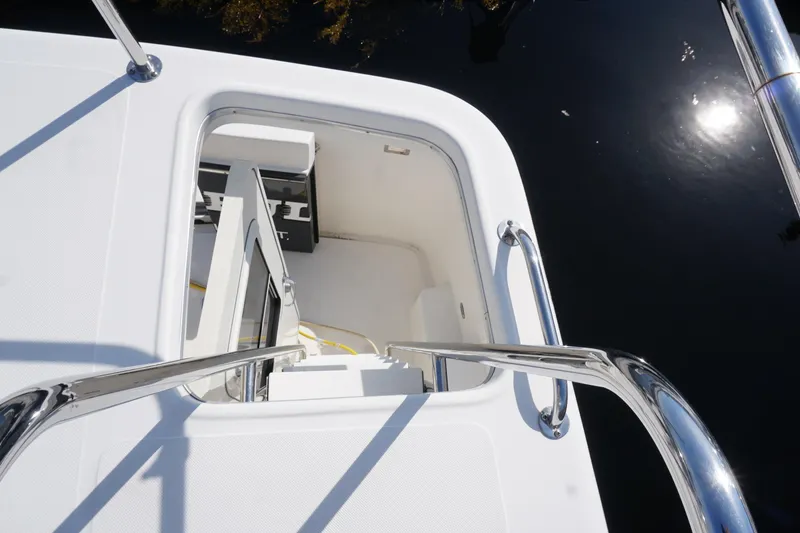 Slide: The Image of Hatch opening on 2004 American Tug 34 boat, with stainless steel railings. - 63