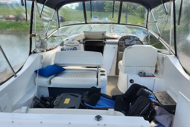 Slide: The Image of Interior view of 2002 Bayliner 2655 Ciera Sunbridge boat with seating and dashboard. - 5