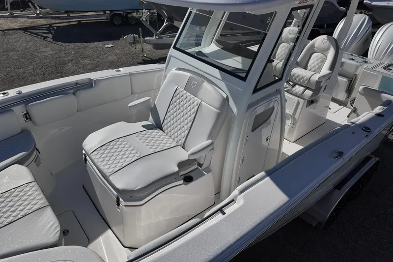 Slide: The Image of 2026 Sea Fox 288 Commander boat interior with cushioned seating and modern design. - 10