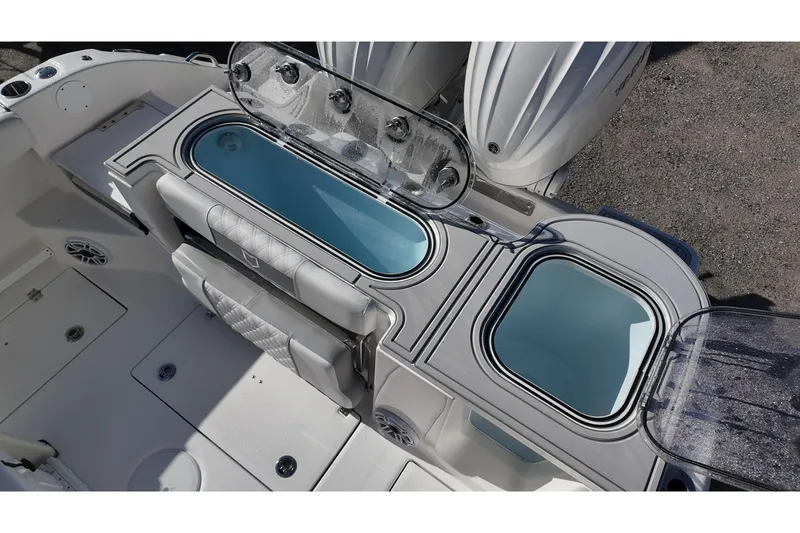 Slide: The Image of 2026 Sea Fox 288 Commander boat interior with livewell and seating. - 14