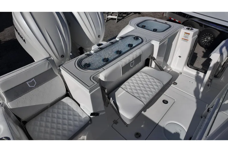 Slide: The Image of 2026 Sea Fox 288 Commander boat interior with seating and storage compartments. - 15