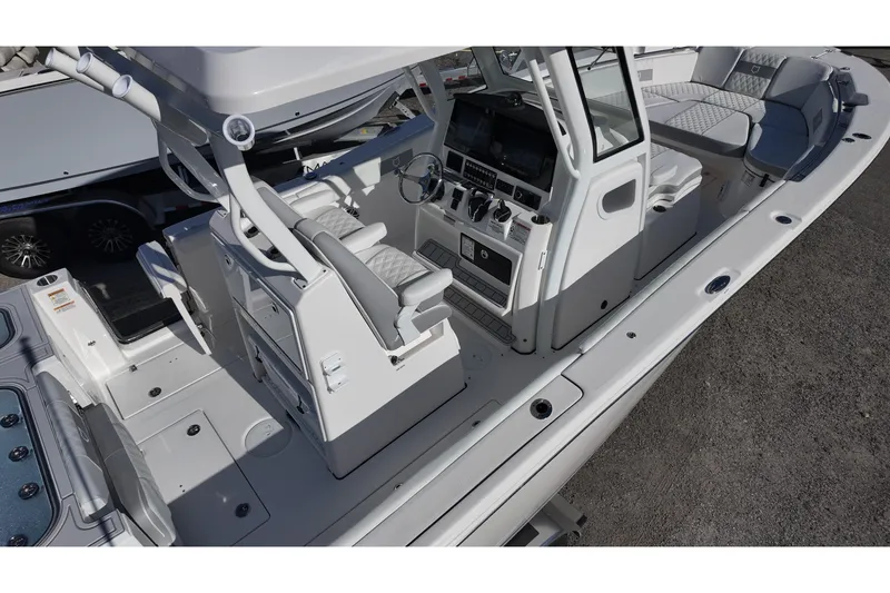 Slide: The Image of 2026 Sea Fox 288 Commander boat interior with helm, seating, and modern controls. - 5