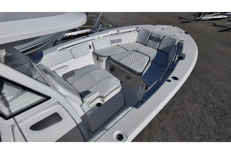 Slide: The Image of 2026 Sea Fox 288 Commander boat interior with cushioned seating and modern design. - 7