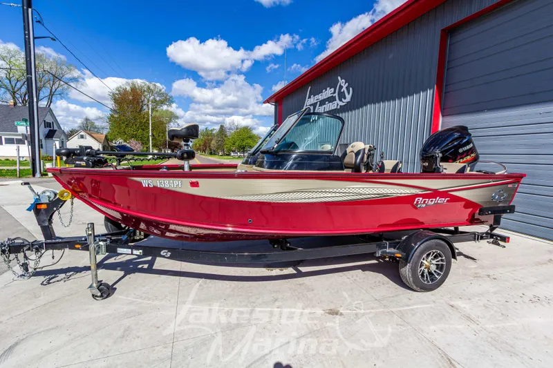 The Image of 2020 G3 Angler V19 FS boat in red, parked outside Lakeside Marina. - 1