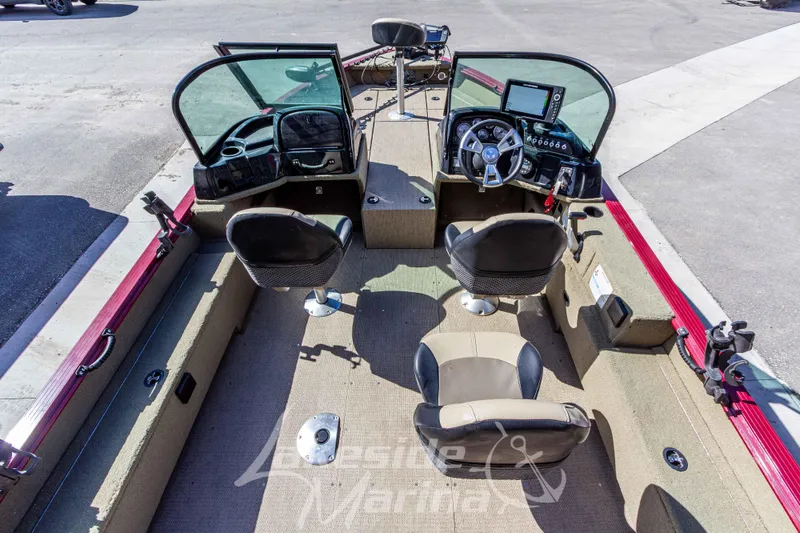 Slide: The Image of 2020 G3 Angler V19 FS boat interior with dual seats and control panel. - 10