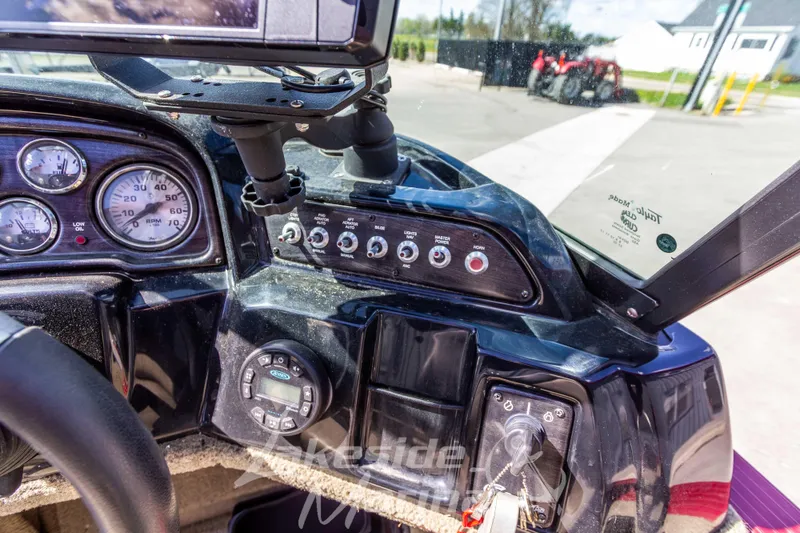 Slide: The Image of Dashboard of 2020 G3 Angler V19 FS boat with gauges and controls. - 18