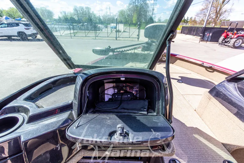 Slide: The Image of 2020 G3 Angler V19 FS boat dashboard with open storage compartment. - 21