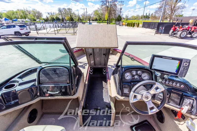 Slide: The Image of 2020 G3 Angler V19 FS boat interior with steering wheel and control panel at Lakeside Marina. - 22