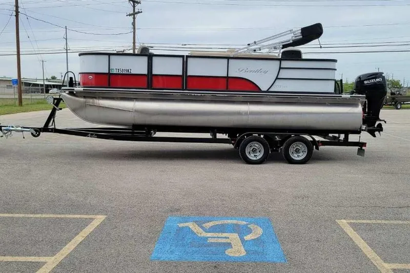 The Image of 2023 Bentley Pontoons 200 Fish on trailer in parking lot. - 0