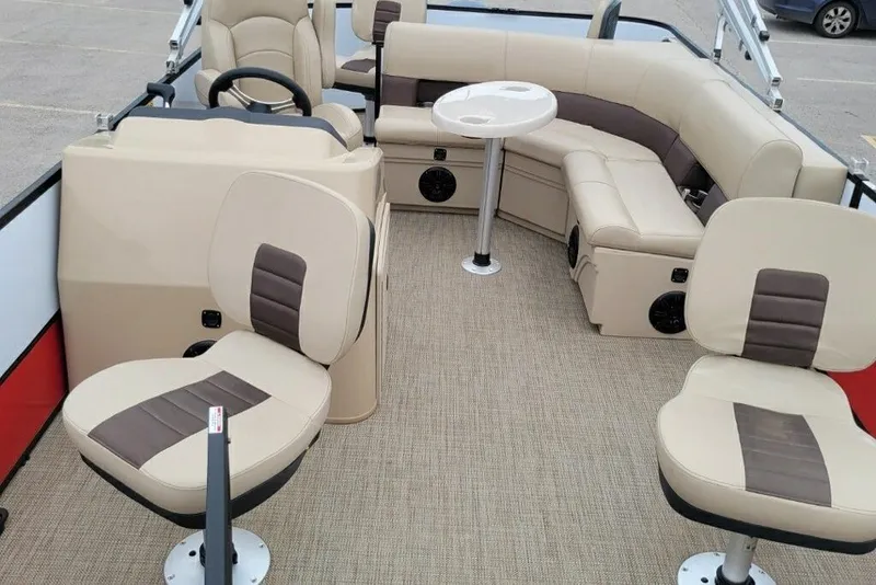 Slide: The Image of 2023 Bentley Pontoons 200 Fish interior with beige seating and table. - 6