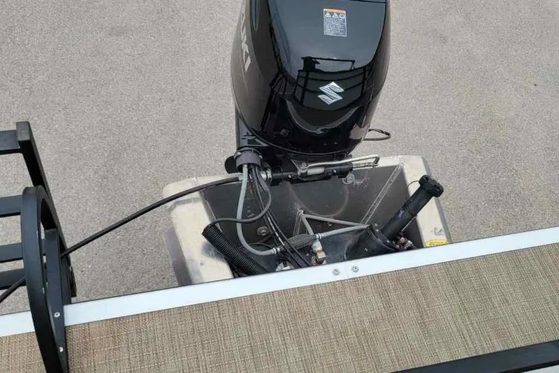 Slide: The Image of 2023 Bentley Pontoons 200 Fish with Suzuki outboard motor, rear view. - 9