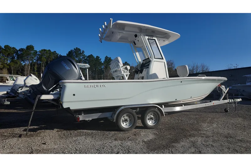 Slide: The Image of 2026 Sea Fox 231 Bay Fox boat on trailer, featuring Yamaha outboard motor. - 2