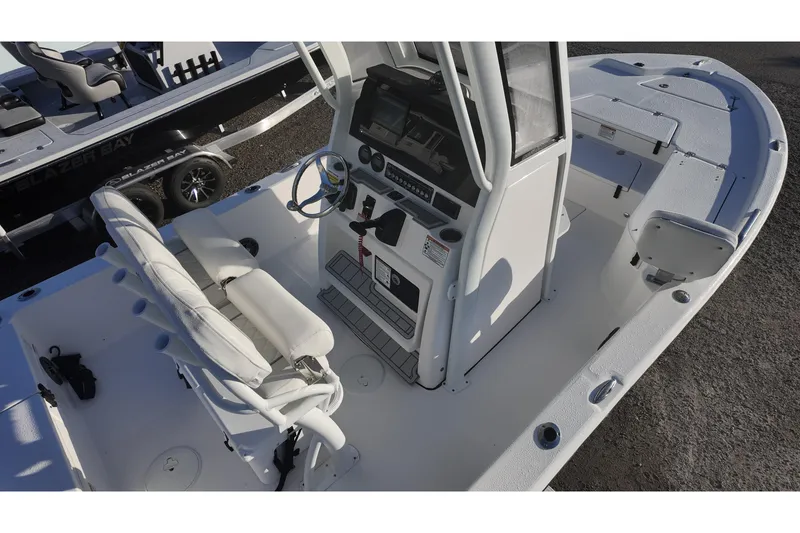 Slide: The Image of 2026 Sea Fox 231 Bay Fox boat interior with steering console and seating. - 5