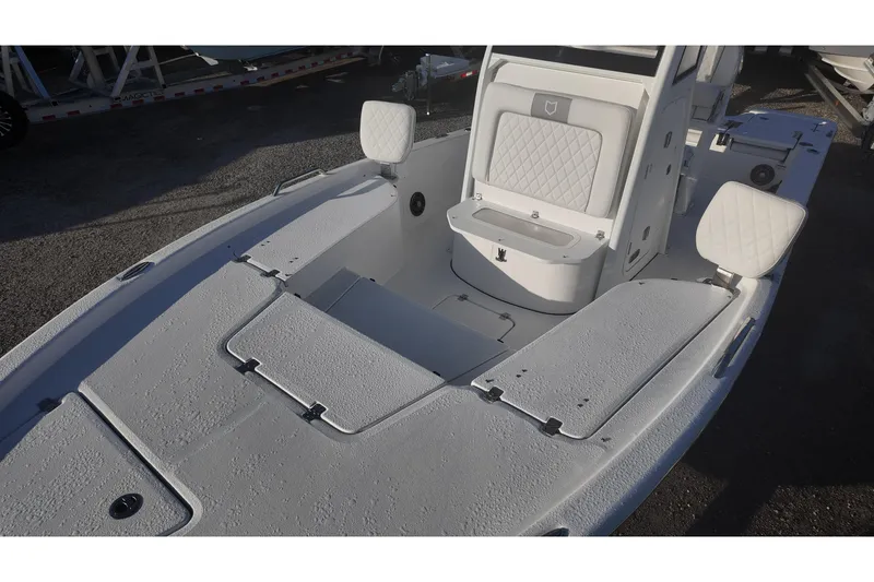 Slide: The Image of 2026 Sea Fox 231 Bay Fox boat interior with seating and storage compartments. - 8