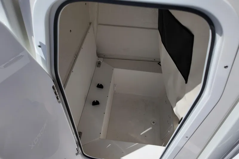 Slide: The Image of Interior view of 2026 Sea Fox 251 Bay Fox storage compartment. - 10