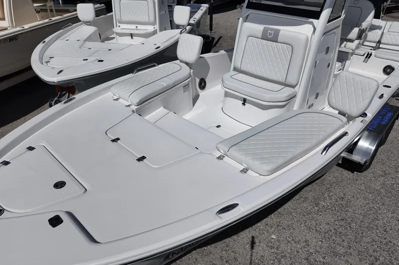 Slide: The Image of 2026 Sea Fox 251 Bay Fox boat with sleek white seating and modern design. - 8
