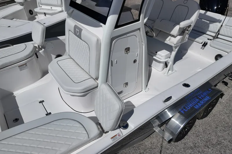 Slide: The Image of 2026 Sea Fox 251 Bay Fox boat interior with cushioned seating and modern design. - 9