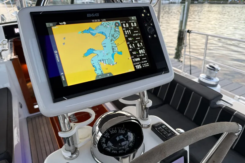 Slide: The Image of Navigation system on a 2014 Hylas 56 yacht, displaying a nautical chart. - 13