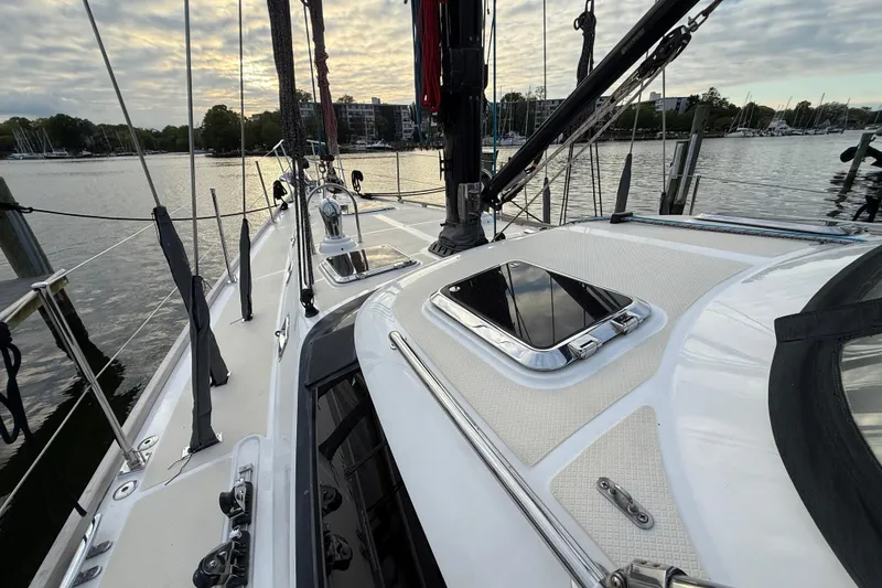 Slide: The Image of Sailing yacht Hylas 56, 2014 model, docked at marina under cloudy sky. - 4