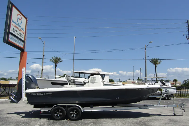 The Image of 2022 Skeeter SX2550 Fish boat on trailer at Nautical Ventures dealership. - 0