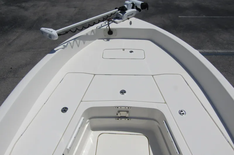 Slide: The Image of 2022 Skeeter SX2550 Fish boat deck with trolling motor, spacious layout. - 11