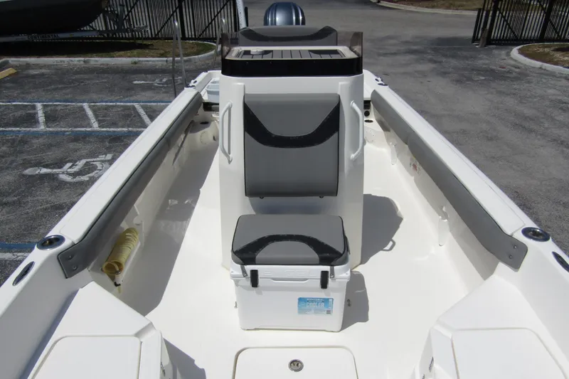 Slide: The Image of 2022 Skeeter SX2550 Fish boat interior with seating and storage compartments. - 14