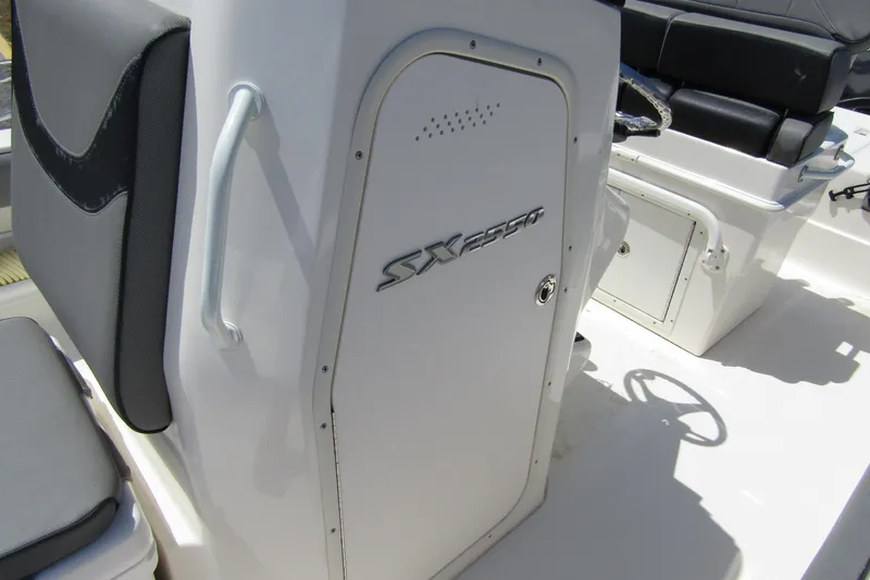 Slide: The Image of 2022 Skeeter SX2550 Fish boat interior with seating and storage compartments. - 15